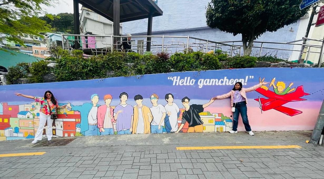Vridhi Kumar at the Gamcheon Culture Village mural in South Korea